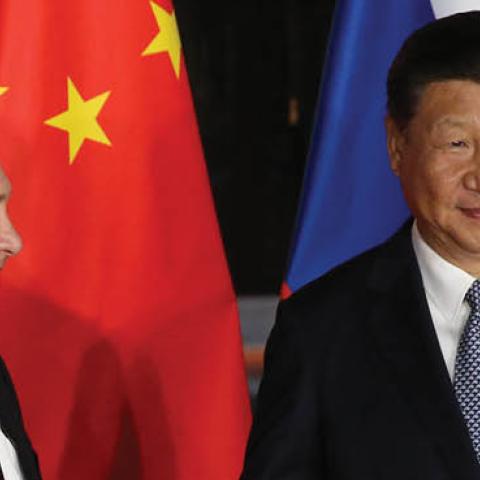 Russian President Vladimir Putin shakes hands with Chinese Leader Xi Jinping during a meeting in Xiamen, China, on September 3, 2017. (Photo by Mikhail Svetlov/Getty Images)