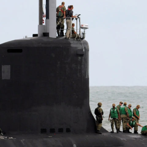 Crew members are seen on the USS Indiana, a nuclear powered United States Navy Virginia-class fast attack submarine, as it departs Port Canaveral in Florida on October 1, 2018. (Photo by Paul Hennessy/NurPhoto via Getty Images)