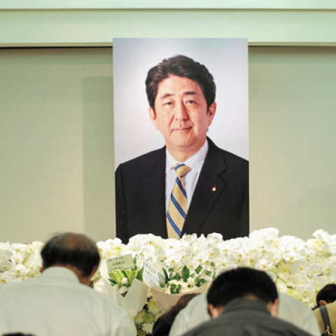  People pay their condolences to former Japanese prime minister Shinzo Abe at the Japan-Taiwan Exchange Association office in Taipei on July 11, 2022. (Sam Yeh/AFP via Getty Images)