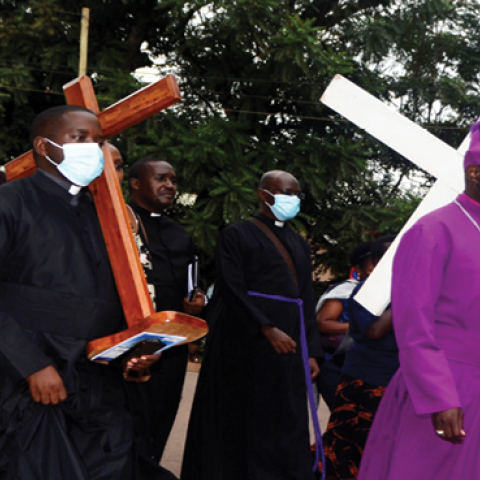 Christian devotees take part in a holy procession on Good Friday in Kampala, Uganda, on April 15, 2022.  (Nicholas Kajoba/Xinhua via Getty Images)