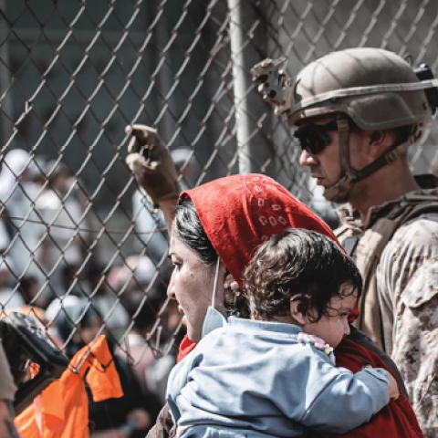 Evacuees await their departure at Hamid Karzai International Airport in Kabul, Afghanistan, August 23, 2021. (Gunnery Sergeant Melissa Marnell/USMC)