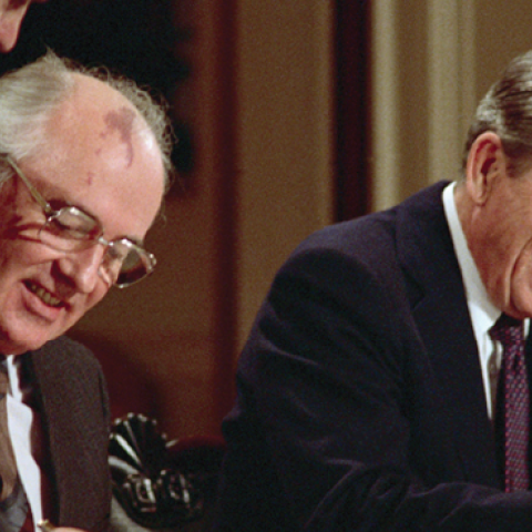 Ronald Reagan and Soviet leader Mikhail Gorbachev signing the arms control agreement banning the use of intermediate-range nuclear missiles, the Intermediate Nuclear Forces Reduction Treaty, in Washington DC on December 8, 1987. (Bettman via Getty Images)