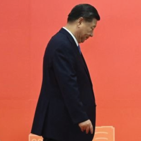 Xi Jinping leaves the podium in Hong Kong at a celebration of the twenty-fifth anniversary of the city's handover from Britain to China. (Selim Chtayti/AFP via Getty Images)