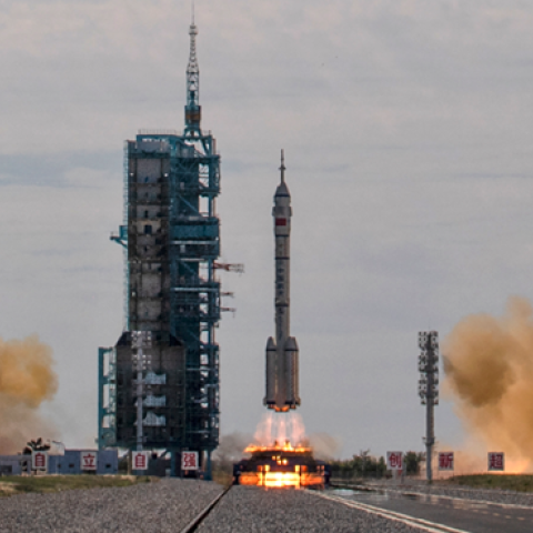 The manned Shenzhou-12 spacecraft onboard the Long March-2F rocket launches at the Jiuquan Satellite Launch Center on June 17, 2021, in Jiuquan, Gansu province, China. (Kevin Frayer/Getty Images)