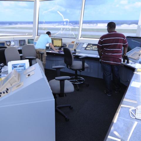 Air traffic controllers direct air and ground operations atop the new air traffic control tower June 11, 2013, at Pope Field, N.C. (Tech. Sgt. Peter R. Miller / U.S. Air Force)